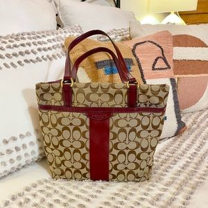 Coach merlot and khaki colored shoulder bag.